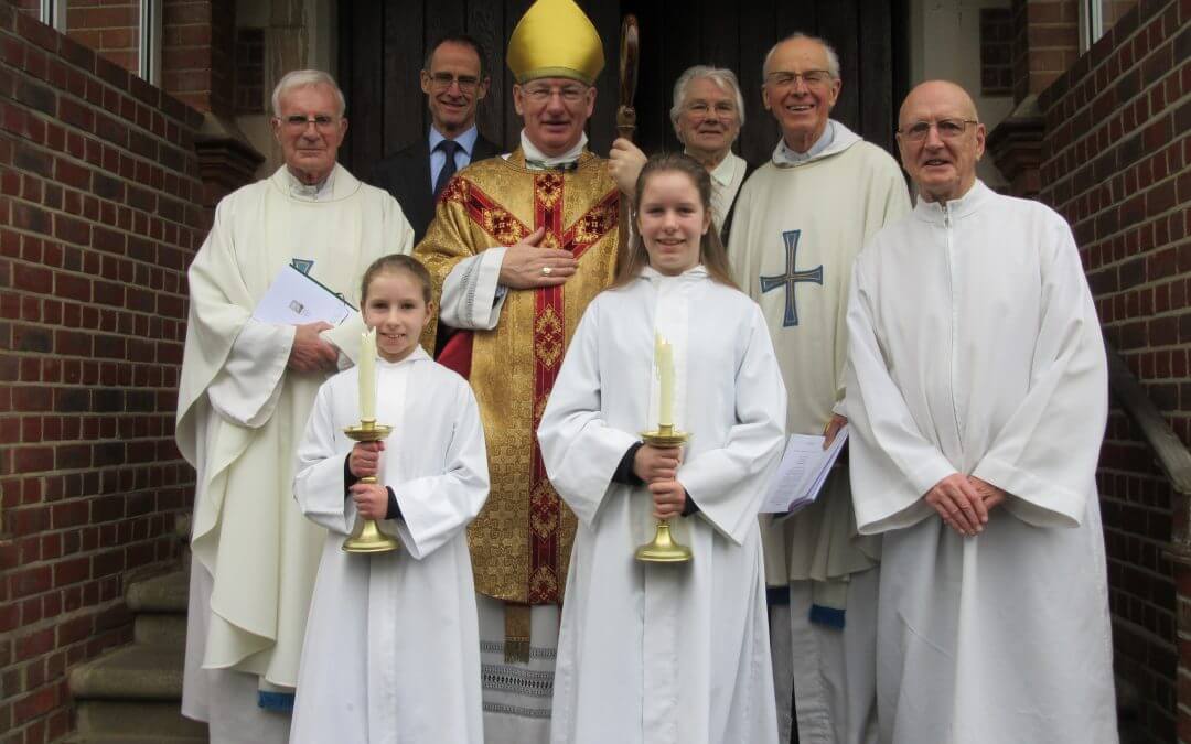 From front left: Emily and Emma Snowden, John Weekes (all Altar Servers), middle row Father Chris Benyon, Bishop Richard Moth, Father Anthony Lovegrove, back row Christopher Hinton CEO and Sister Mary Agnes, Trustee.