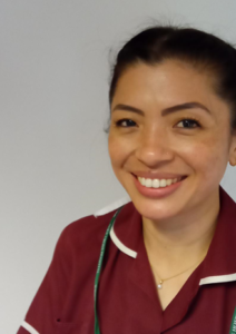 Head and shoulders of smiling nurse